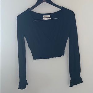 Urban Outfitters long sleeve ruffled crop top.